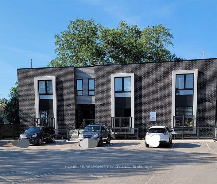 Unit 102 6065 McLEOD Road photo 1