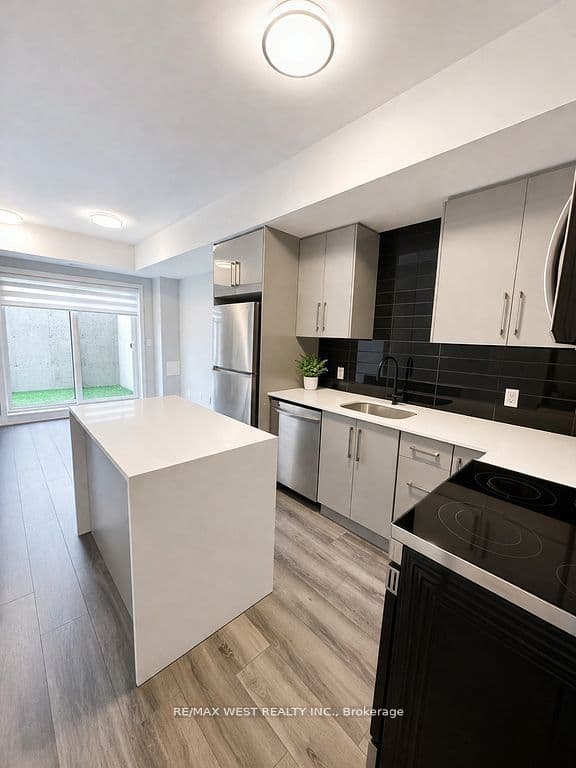 Unit 110 6065 McLeod Road photo 1